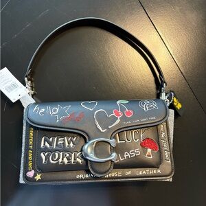 Coach Black Shoulder Bag with Artistic Accents